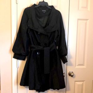 Black double breasted slick rain coat